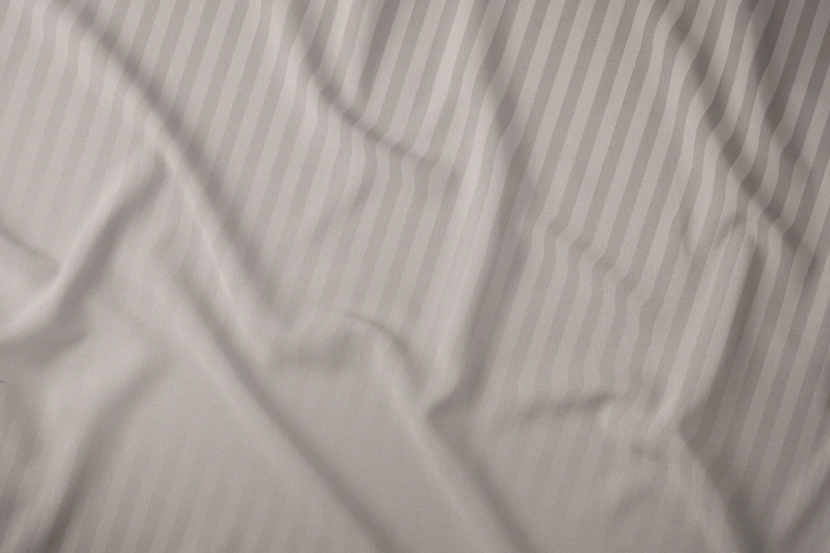 Prémium bézs ágynemű damaszt anyaga közelről