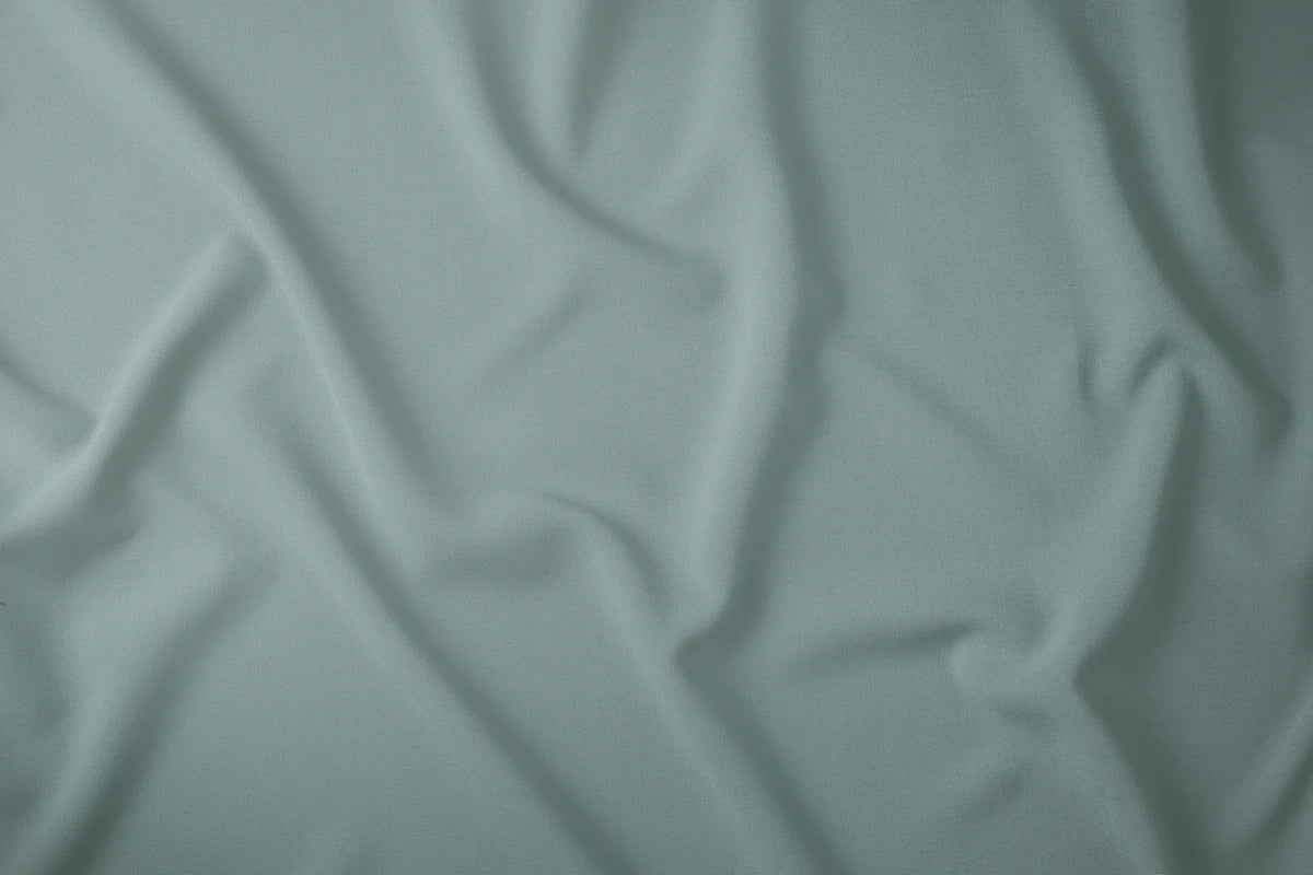 Prémium zöld gumis lepedő szatén anyaga közelről