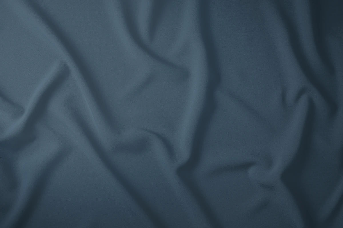 Prémium kék pamut lepedő anyaga közelről